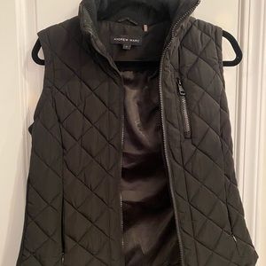 Small black vest with pockets